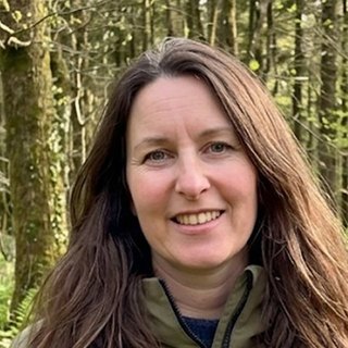Anna in bluebell woods in spring.